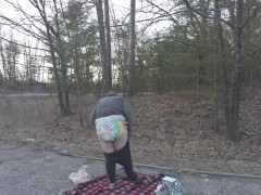 DiaperSlaveA - Putting her close back on after diaper change in the park