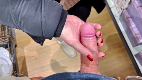 Handjob with lots of spit in a store :P so risky in public