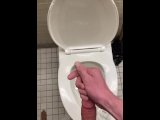 Jerking off in bathroom stall