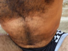 Hairy Latino man strips naked in his neighbor's yard and shows her his dick