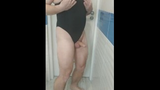Boy wearing sexy Black one piece swimsuit