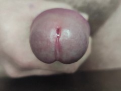 Close-up handjob foreskin precum and cum