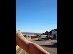 Perverted Tattooed Spanish milf in bike and tiger bikini shows tits on street