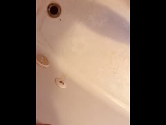 Pissing in the tub and all over my legs!!