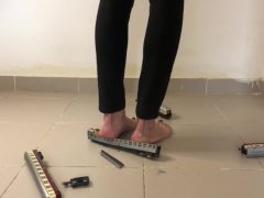 Woman Crushing Toy Trains Under Her Big Feet