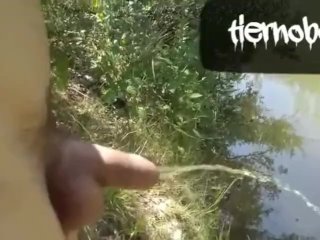 Naked Twink in the River is Pissing and Cumming