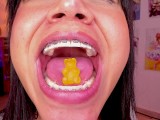 Lila Jordan swallows a yellow gummy bear, Giantess Vore fetish
