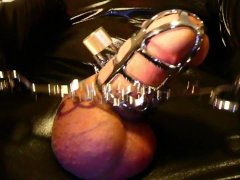 Rubbing Handcuffs on a Caged Cock Trying to cum