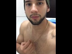 Cute muscled guy gets horny and masturbates in his clothes