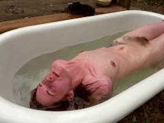 Hairy babe takes outdoor bath