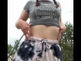 Cute teen strips outside