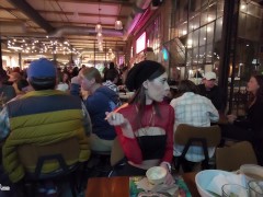 Tits and pussy exposed in a crowded bar while eating a sweet treat!