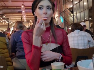 Tits and pussy exposed in a crowded bar while eating a sweet treat!