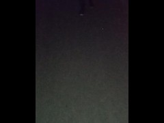 showing tits at dark street