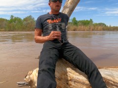 Older punk dude getting covered in piss outdoor