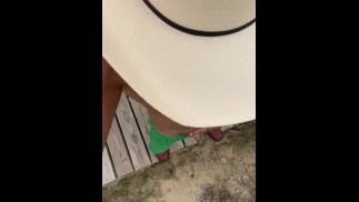 Asian cowboy with tiny penis taking a piss