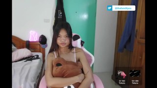 Cute Thai girl puts on a show