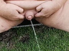 Fat man Flaccid Cock pissing and playing outside naked