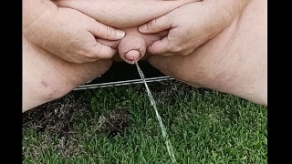 Fat man Flaccid Cock pissing and playing outside naked