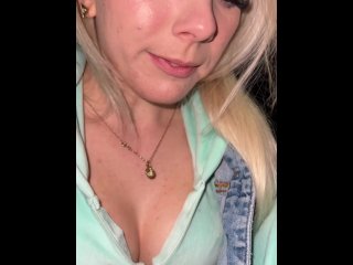 A sick blondie is hocking gagging coughing and spitting phlegm and loogies making a big spit puddle