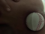 Baseball in ass