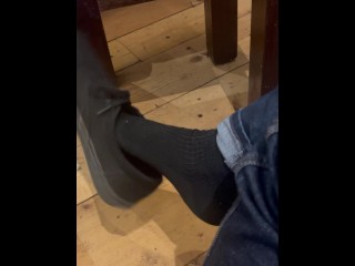 Shoeplay and Dangling in Vans and Black Socks in the Coffee Shop