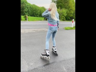 A Rollerblade Blondie Girl is Littering and Smoking and Spitting Loogies while Smoking a Cigarillo