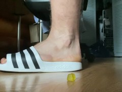 Crush gummy bears by feet
