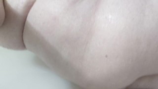 Chubby bottom bitch fucks dildo in shower