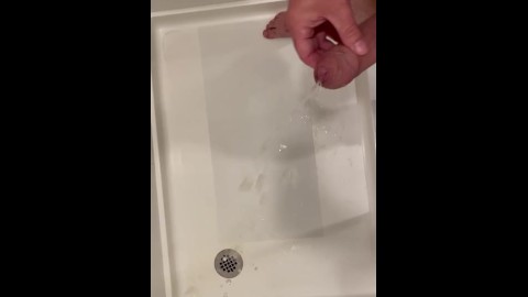 Cumming hard in hotel shower, pissing