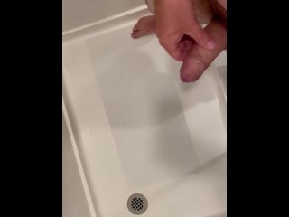 Cumming hard in hotel shower, pissing