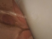 Preview 5 of trans peeing in tan nylons dirty bathtub