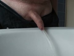 Boy Peeing with closed Foreskin