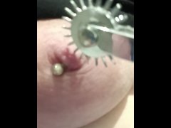 Painful nipple torture needle pricking pinwheel on pierced tits