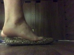 Candid feet under desk at work office jelly shoe flats shoeplay