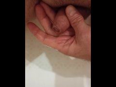 Pissing in the bathroom in my palm and jerking off my dick to the boner.
