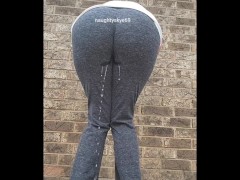 Pee slut pees pants outdoors