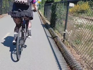 Following Woman_in Mini Skirt and Fishnets Biking