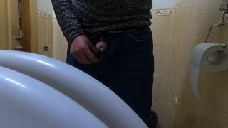 Close up jerk in a toilet