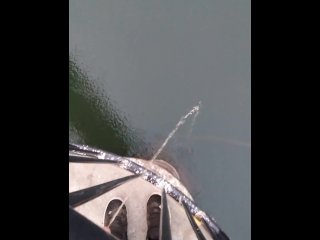 Pissing off the side of pedestrian bridge