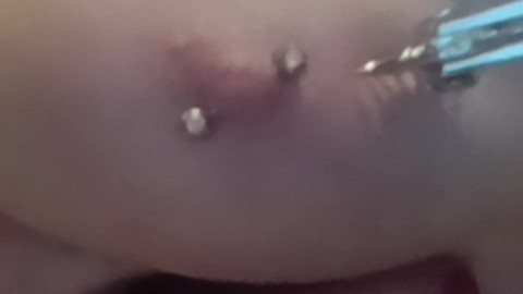 Pricking my pierced tits with kinky painful pinwheel all over my sensitive nipple piercings