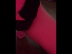 Dancing in front of the mirror and caressing her pussy.