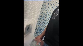 Jacking off at the mall urinals