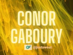 A naked guy smokes a cigarette in front of everyone