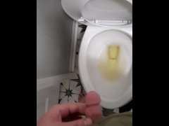 Huge average dick pissing in toilet shaking cock off