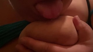 Licking and sucking my big juicy nipples