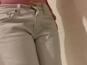 Preview 1 of Wetting locked on white jeans. Massive Piss desperation