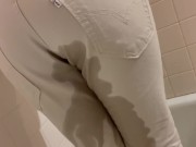 Preview 2 of Wetting locked on white jeans. Massive Piss desperation