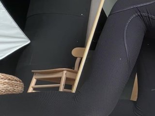 barefoot stretching in tight leggings