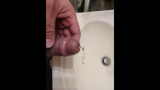 Hairy bear pisses and cums in sink.  Close up, HD